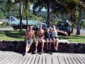 Bruce, Kelly boy , Tristan & Kelly girl withstanding the winds on the dock in Uturoa, Raiatea.